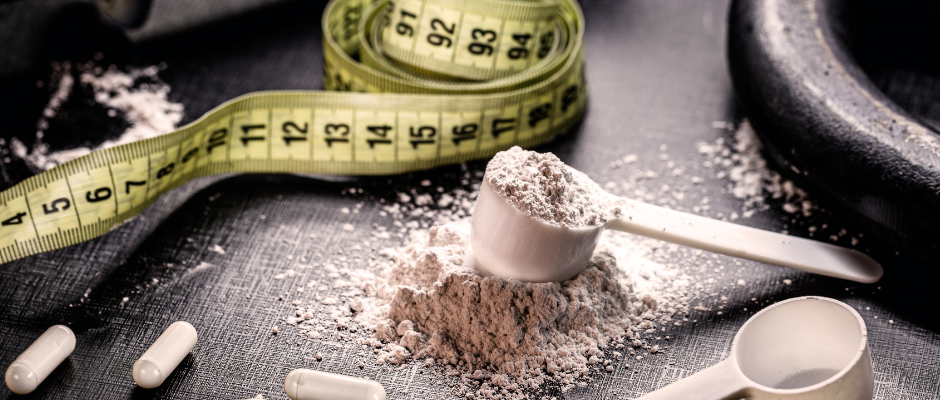 A selection of nutritional powders including protein powders, mass gainers, and creatine for boosting caloric intake